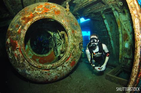 History Of Grand Cayman's Kittiwake Shipwreck | Scuba Diving