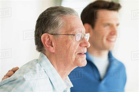 Caucasian Father And Son Smiling Stock Photo Dissolve