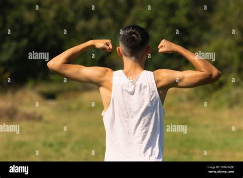 Teen Boy Flexing Arm Hi Res Stock Photography And Images Alamy