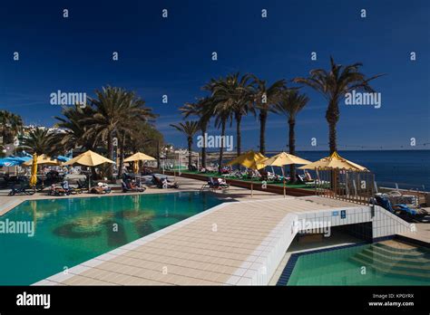 Malta, St. Paul's Bay area, Qawra, Qawra Palace Hotel pool area Stock Photo - Alamy