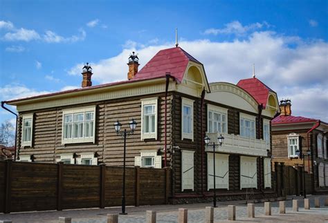 A Brown and Beige Wooden House Under Blue Sky · Free Stock Photo