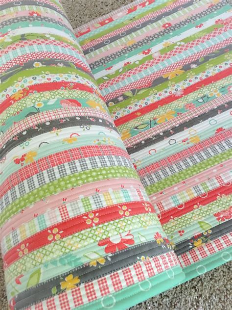 Carried Away Quilting: Fun project alert: the jelly roll rug!