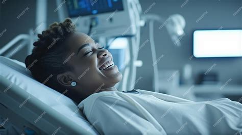 Premium Ai Image A Woman Lying In A Hospital Bed Smiling And Looking