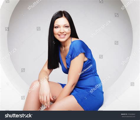 Sexy Brunette Blue Dress Sitting Circle Stock Photo Shutterstock