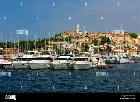 Vrsar Yachts And Sailing Boats In Harbour In Front Of Old Town Istria