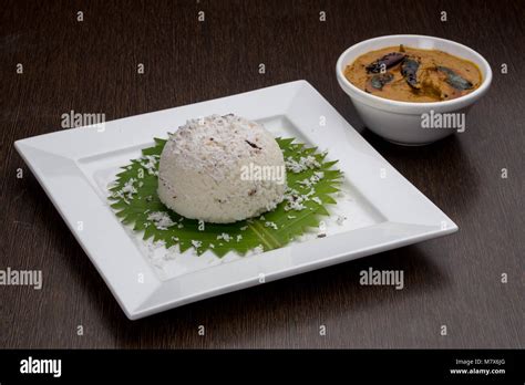 Puttu With Fish Curry Stock Photo Alamy