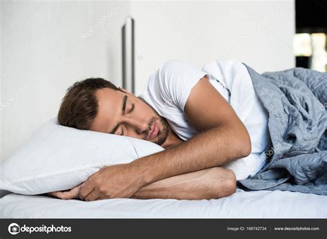 Man Sleeping In Bed Stock Photo By Allaserebrina