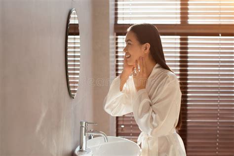 Pretty Chinese Woman Looking At The Mirror Stock Image Image Of Care