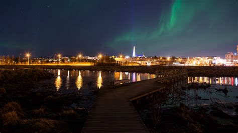 Aurora Borealis Over Reykjavik Pond Walkway Stock Footage SBV-348690299 ...