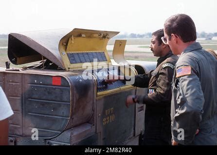 A Member Of The 50th Tactical Airlift Squadron Replaces A Valve On A C