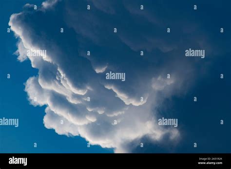 Storm cloud formation of anvil clouds Stock Photo - Alamy