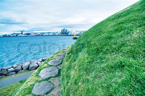 Thufa hill in Reykjavik with city ... | Stock image | Colourbox