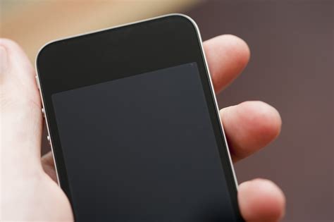 Hand Holding A Smart Mobile Black Phone 6822 Stockarch Free Stock Photos