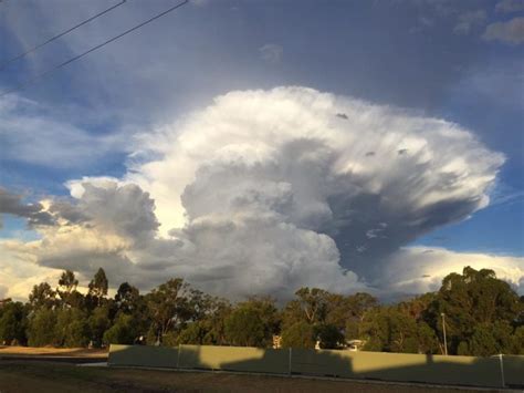 Apocalyptical anvil cloud at sunset swallows up Chinchilla, Australia ...