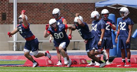 Spiders' football, men's and women's basketball players, can return to campus on July 15 ...