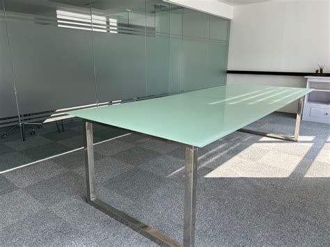 Long glass conference table on Carousell