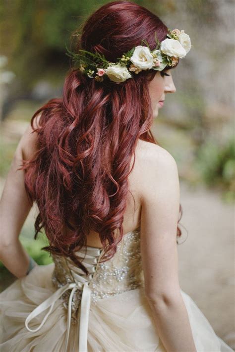 Bride with crimson red hair, wearing a floral crown. Fairytale wedding ...