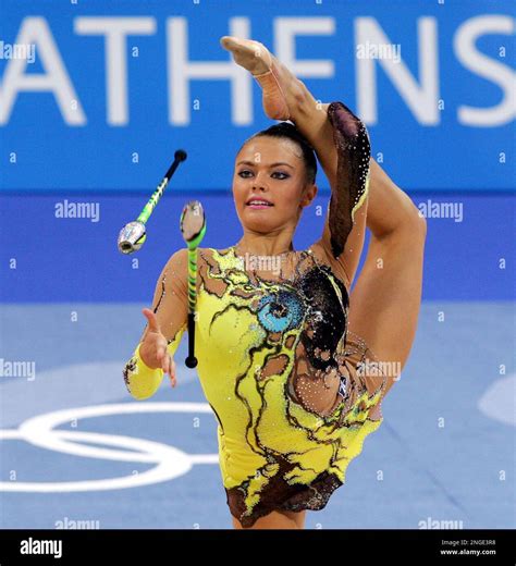 Alina Kabaeva Of Russia Performs With Clubs During The Rhythmic