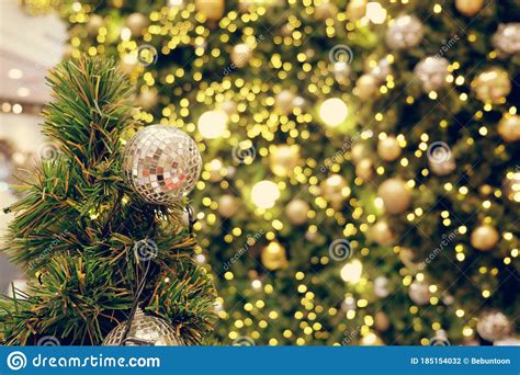 Christmas Background Of De Focused Lights With Decorated Tree Stock