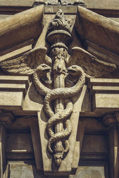 Carved Caduceus Symbol Carved Bas Relief Depicting Two Serpents Twined