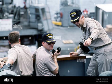 CAPT A L Heisig Right Commanding Officer And CMDR S Markey