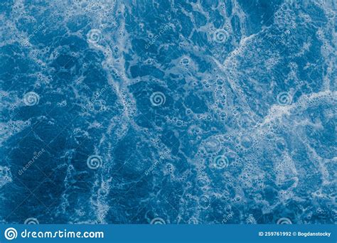 Dark Blue Sea Surface With Waves Splash And Bubbles Stock Photo