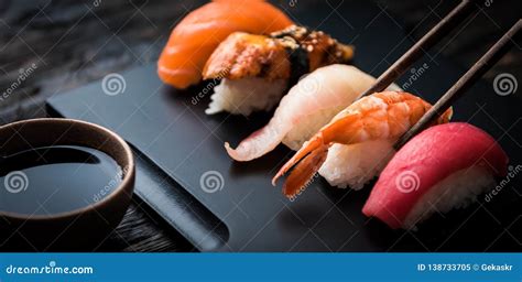 Close Up Of Sashimi Sushi Set With Chopsticks And Soy Stock Image