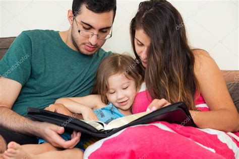 Family Reading the Bible Together Stock Photo by ©Balazs 120425158