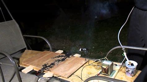 Burning Lichtenberg Figures Into Wood With A Microwave Transformer