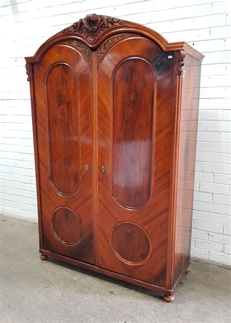 Lot 19th Century Continental Walnut Armoire With Carved Crest And Two Oval Panel Doors Some