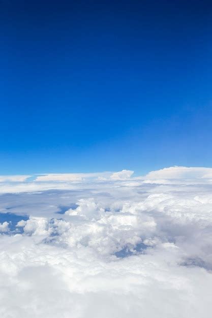 Premium Photo Clouds A View From Airplane Window