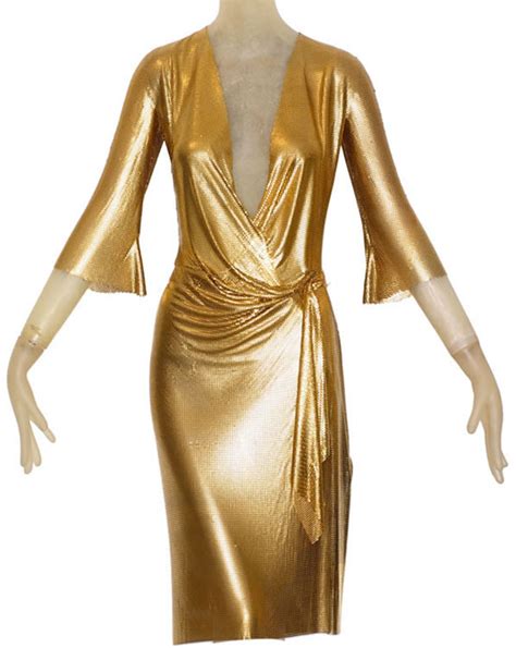 Gianni Versaces Gold Draped ‘oroton Dress To Go Gold Bold