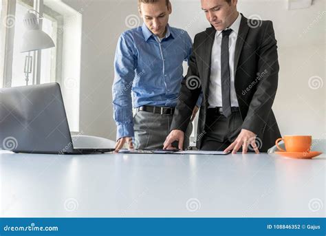 Two Businessmen Having A Serious Discussion Stock Photo Image Of