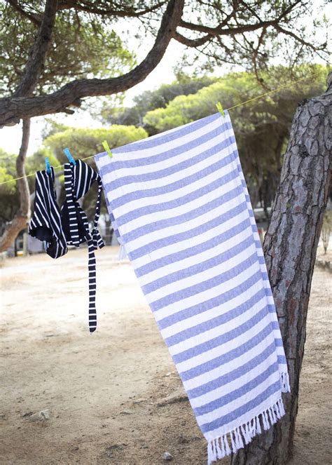 Bikini And Towel Hanging On Clothesline At Camsite Stock Photo