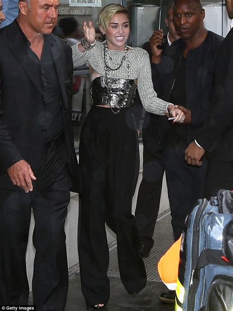 Miley Cyrus Gets Fully Naked To Straddle Wrecking Ball In Video Of The Same Name Daily Mail Online