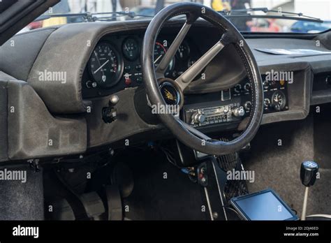 Close up detail of the dark grey interior, dashboard and steering wheel ...