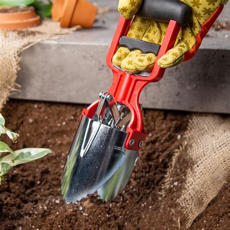 Uncommon Goods | One-Handed Dirt Digging Tool | Gardening