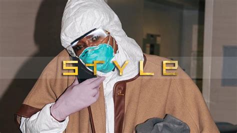 Naomi Campbell Goes Through Lax In Hazmat Suit To Protect Herself From