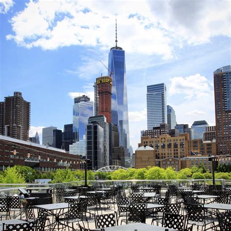 City Vineyard New York | Members receive a welcome glass of red, white ...