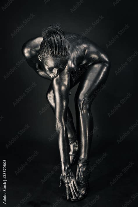 Nude Woman Like Statue In Liquid Metal Stock Photo Adobe Stock