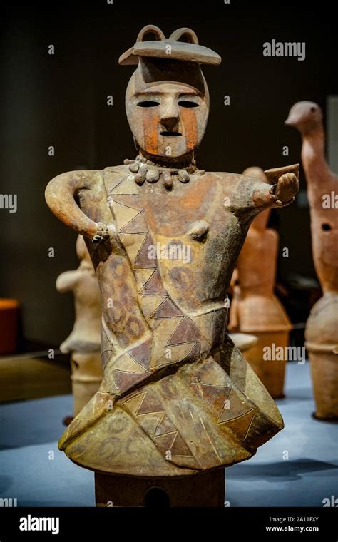 Haniwa Terracotta Tomb Figurine Woman With A Painted Face Offering A