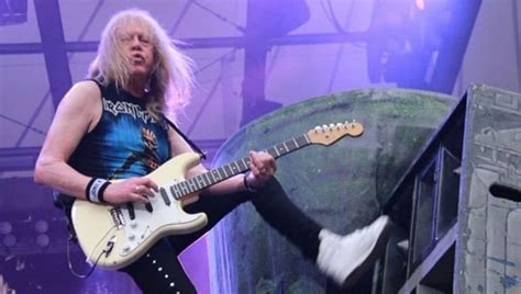 Watch Iron Maiden's Janick Gers accidentally launch guitar into a crowd