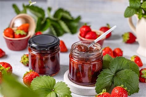 Premium Photo Fresh Homemade Strawberry Jam In Glass Jar On A Light