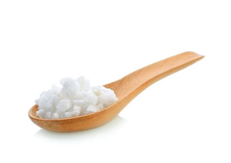 Premium Photo Salt In A Wooden Spoon