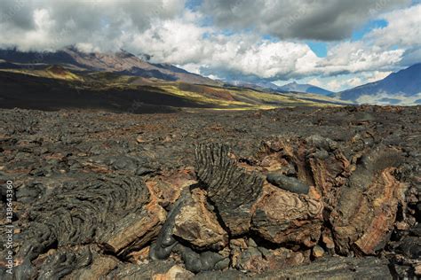 Lava Field At Tolbachik Volcano After Eruption In On Background