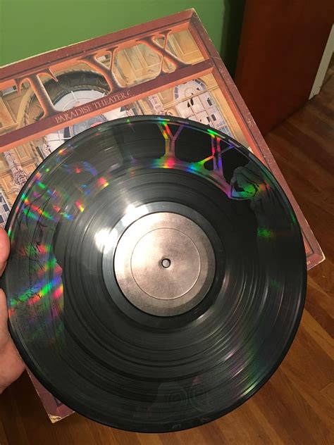 My copy of Paradise Theater by Styx has some real cool artwork on the ...