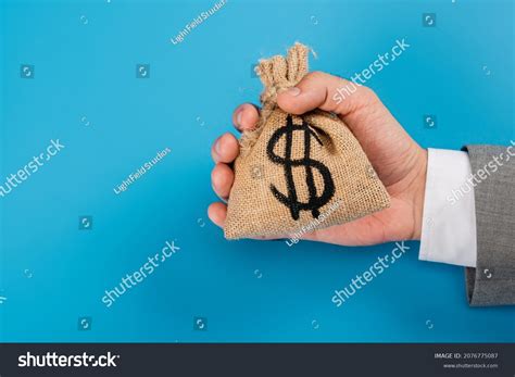 Cropped View Man Holding Money Bag Stock Photo 2076775087 Shutterstock