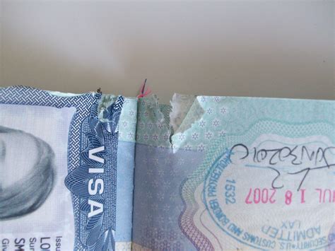 Chewed Passport.. Help! - British Expats
