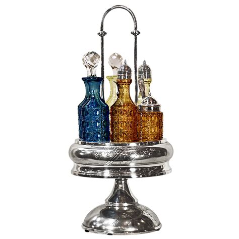 American Silver Plate Castor Set With Multi Color Bottles By Meriden