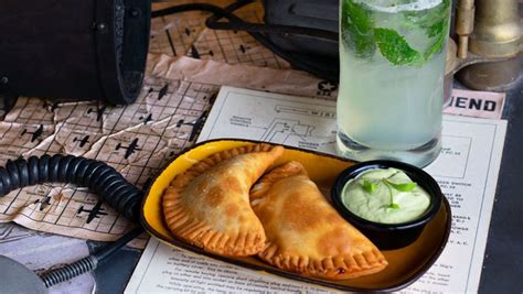 Satipo’s Empanadas and Poisonless Dart drink from Jock Lindsey’s Hangar ...